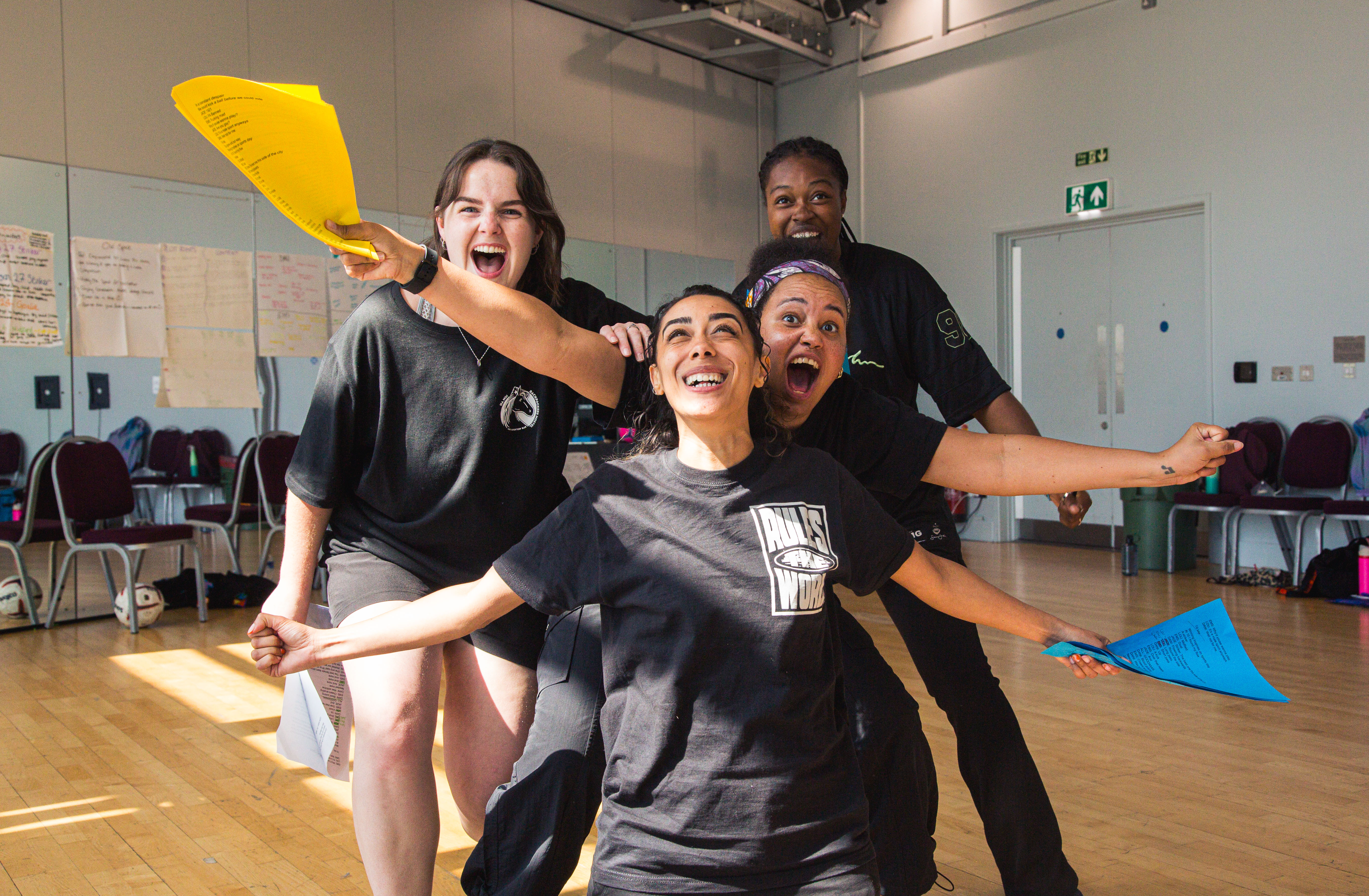 90 + 5 R&D shot of 4 women celebrating 